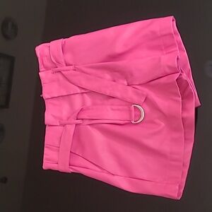 Pink leather shorts